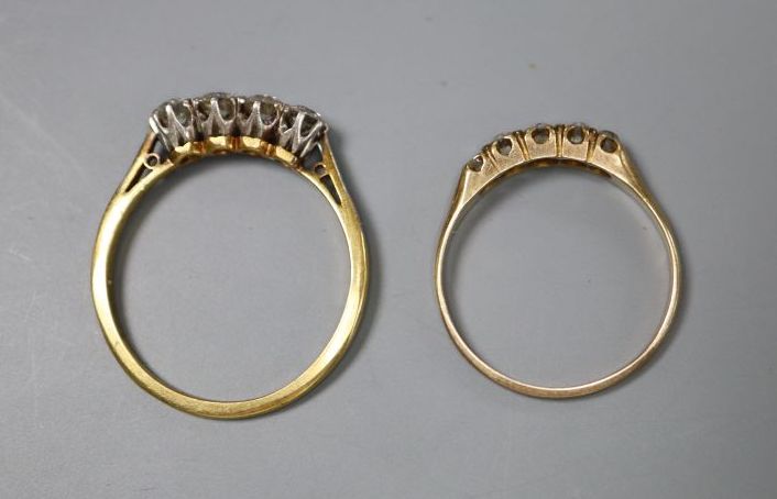 An early 20th century 18ct and plat, four stone diamond ring, size O and a yellow metal and graduated five stone diamond ring